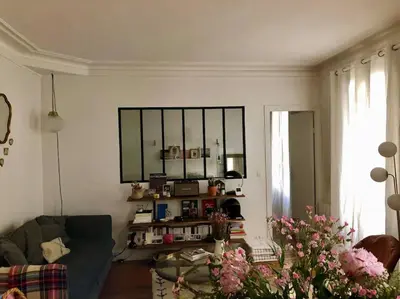 Coin salon dans l'établissement Appartement 75009 PARIS 50m2 métro poissonnière 3 pers & baby