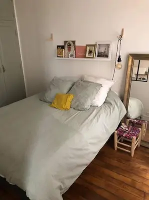 Un ou plusieurs lits dans un hébergement de l'établissement Appartement 75009 PARIS 50m2 métro poissonnière 3 pers & baby