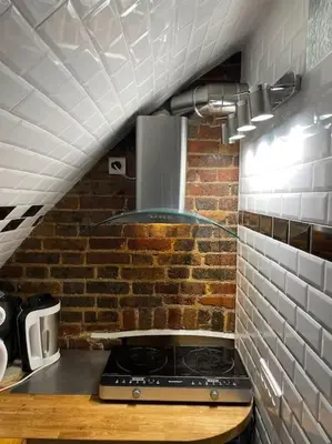 Cuisine ou kitchenette dans l'établissement Prince