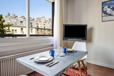 Télévision ou salle de divertissement dans l'établissement Appartement Folie-Méricourt - Welkeys