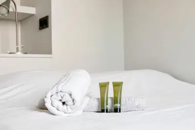 Un ou plusieurs lits dans un hébergement de l'établissement Appartement Folie-Méricourt - Welkeys