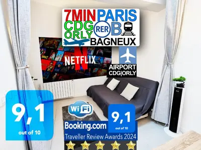 Télévision ou salle de divertissement dans l'établissement Bagneux Paris RER B Confort Netflix