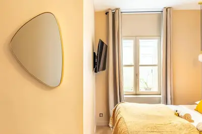Télévision ou salle de divertissement dans l'établissement Lovely apartment in the heart of Paris