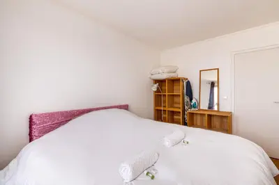Un ou plusieurs lits dans un hébergement de l'établissement GuestReady - Magic View Montparnasse Big Terrace