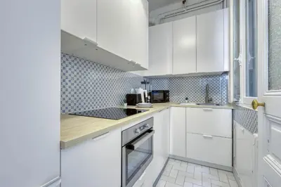 Cuisine ou kitchenette dans l'établissement Lovely & quiet 1 Bdr Flat at the Luxury 16th Paris