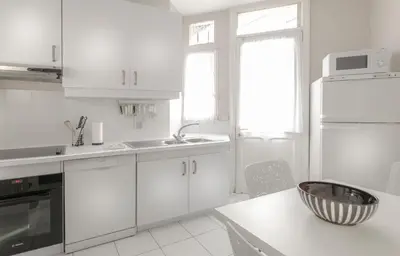 Cuisine ou kitchenette dans l'établissement Résidence Charles Floquet