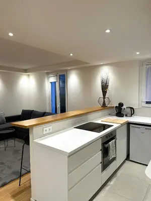 Cuisine ou kitchenette dans l'établissement Cosy, appartement refait à neuf limite 16