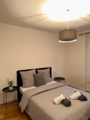 Un ou plusieurs lits dans un hébergement de l'établissement Cosy, appartement refait à neuf limite 16