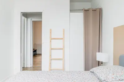 Un ou plusieurs lits dans un hébergement de l'établissement Appartement F3 55m2 à 5' de Paris
