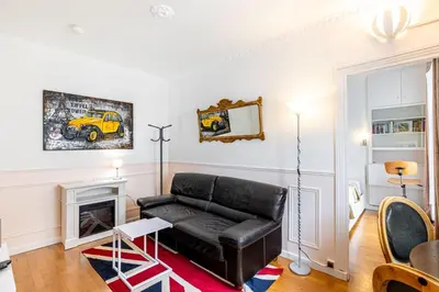 Coin salon dans l'établissement GuestReady - Appartement baigné de lumière au 7e.
