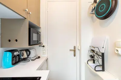 Cuisine ou kitchenette dans l'établissement GuestReady - Appartement baigné de lumière au 7e.