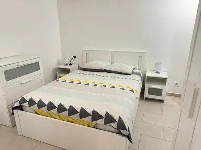 Un ou plusieurs lits dans un hébergement de l'établissement Charming intim apartment in Paris South