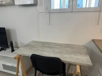 Télévision ou salle de divertissement dans l'établissement Charming intim apartment in Paris South