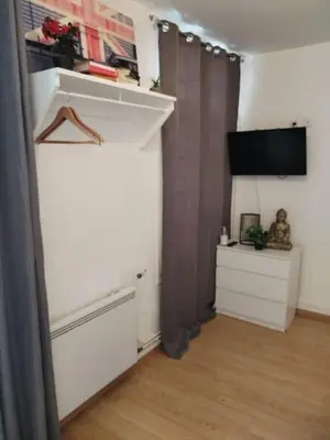 Télévision ou salle de divertissement dans l'établissement Studio Rue de la Santé