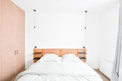 Un ou plusieurs lits dans un hébergement de l'établissement Parking Gratuit - Montmartre Charme & Patio Privé - Sacré-Cœur Metro Anvers