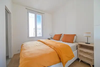 Un ou plusieurs lits dans un hébergement de l'établissement Vue Tour Eiffel / Sacré-Coeur