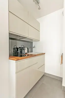 Cuisine ou kitchenette dans l'établissement Arc de Triomphe Luxury Place