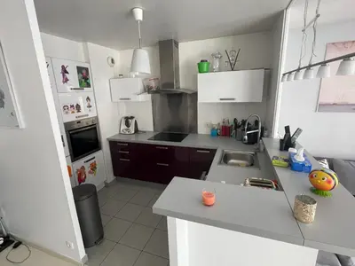 Cuisine ou kitchenette dans l'établissement F4 lumineux proche du stade de France