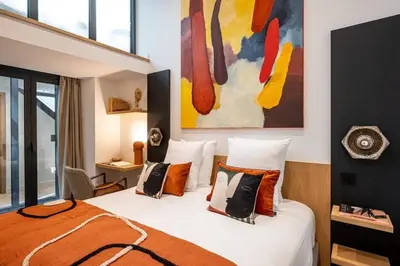 Un ou plusieurs lits dans un hébergement de l'établissement My Skydome - Marais - Lancry - 4 Suites de luxe avec climatisation