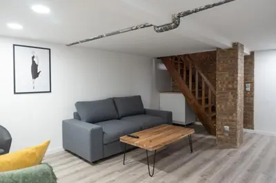 Coin salon dans l'établissement Appartement spacieux et confortable à Paris 17ème
