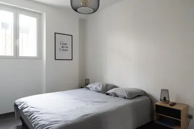 Un ou plusieurs lits dans un hébergement de l'établissement Appartement spacieux et confortable à Paris 17ème