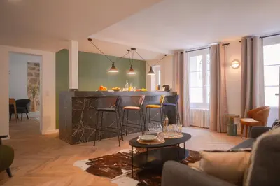 Coin salon dans l'établissement Le M. Musée du vin - l'appartement
