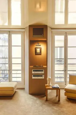 Coin salon dans l'établissement Les Suites Cinabre