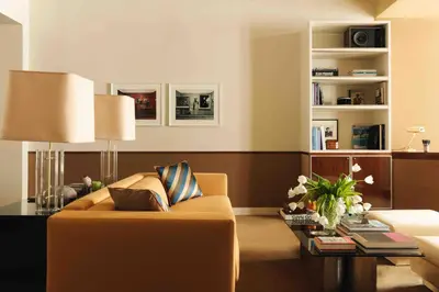 Coin salon dans l'établissement Les Suites Cinabre