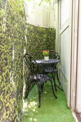 Jardin de l'établissement Duplex Parisien charmant en face métro13