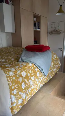 Un ou plusieurs lits dans un hébergement de l'établissement Studio cosy Paris 6ème Bon Marché