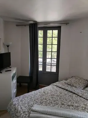 Un ou plusieurs lits dans un hébergement de l'établissement Studio Saint-Jacques