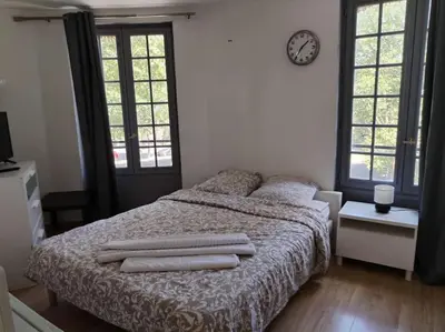 Un ou plusieurs lits dans un hébergement de l'établissement Studio Saint-Jacques
