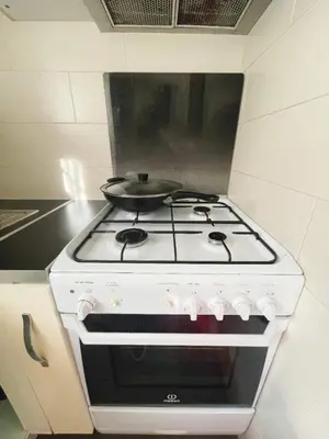 Cuisine ou kitchenette dans l'établissement Pink Warm Studio near Arc de Triomphe