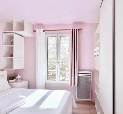 Un ou plusieurs lits dans un hébergement de l'établissement Pink Warm Studio near Arc de Triomphe