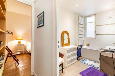 Un ou plusieurs lits dans un hébergement de l'établissement GuestReady - Boulogne near Roland-Garros
