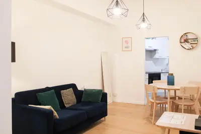 Coin salon dans l'établissement Appartement chaleureux - proche Montmartre