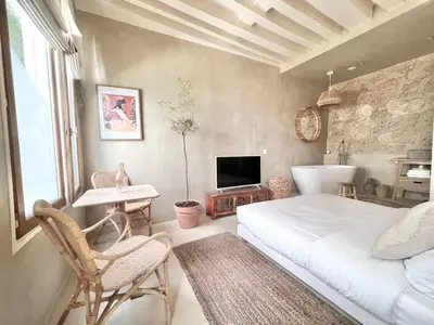 Un ou plusieurs lits dans un hébergement de l'établissement Studio de charme pour un séjour en amoureux - 2P - FLAT-GUEST