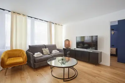 Télévision ou salle de divertissement dans l'établissement Residense Montmartre by Studio prestige