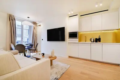 Télévision ou salle de divertissement dans l'établissement Elegant apartment - 2BR 6P - Opéra