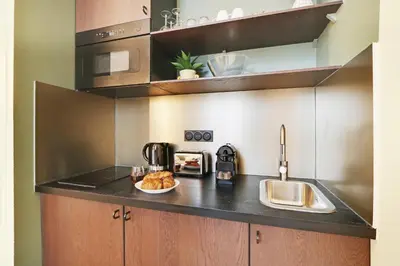 Cuisine ou kitchenette dans l'établissement Amazing apartment - 2P/1BR Université de Paris Tolbiac