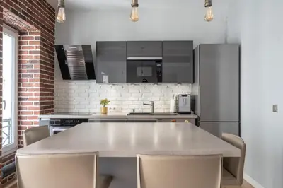 Cuisine ou kitchenette dans l'établissement Cosy central place Paris