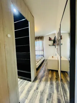 Un ou plusieurs lits dans un hébergement de l'établissement Spacious Cozy Apartment close Paris & Flea Market at St Ouen