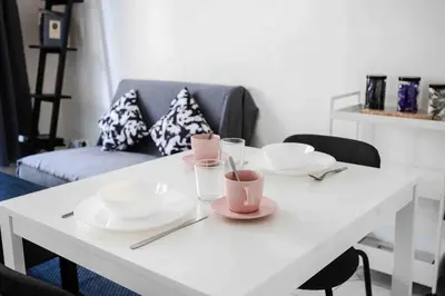 Coin salon dans l'établissement Promo! Beautiful apt near the Galeries Lafayette!