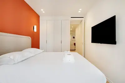 Un ou plusieurs lits dans un hébergement de l'établissement Chic apartment - 2BR-6P - Opera House