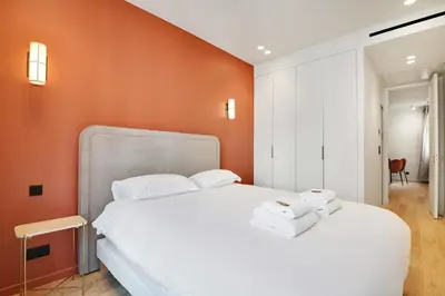 Un ou plusieurs lits dans un hébergement de l'établissement Chic apartment - 2BR-6P - Opera House