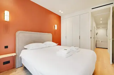 Un ou plusieurs lits dans un hébergement de l'établissement Chic apartment - 2BR-6P - Opera House