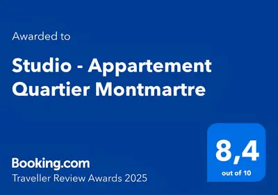 Certificat, récompense, panneau ou autre document affiché dans l'établissement Studio - Appartement Quartier Montmartre Free Netflix