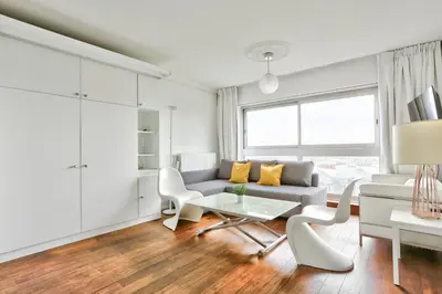 Coin salon dans l'établissement Studio - Appartement Quartier Montmartre Free Netflix