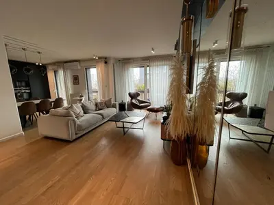 Coin salon dans l'établissement Appartement Luxueux climatisé avec Terrasse, 6 couchages - 17ème Arrondissement de Paris