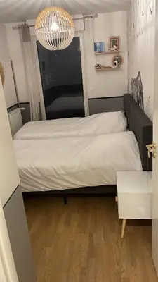 Un ou plusieurs lits dans un hébergement de l'établissement Appartement Luxueux climatisé avec Terrasse, 6 couchages - 17ème Arrondissement de Paris